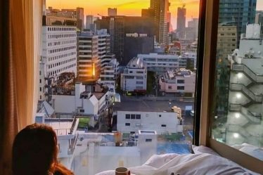 Sunrise view of Tokyo Tower from Deluxe King Room CandeoHotels Roppongi Tokyo whatsupcourtney.com