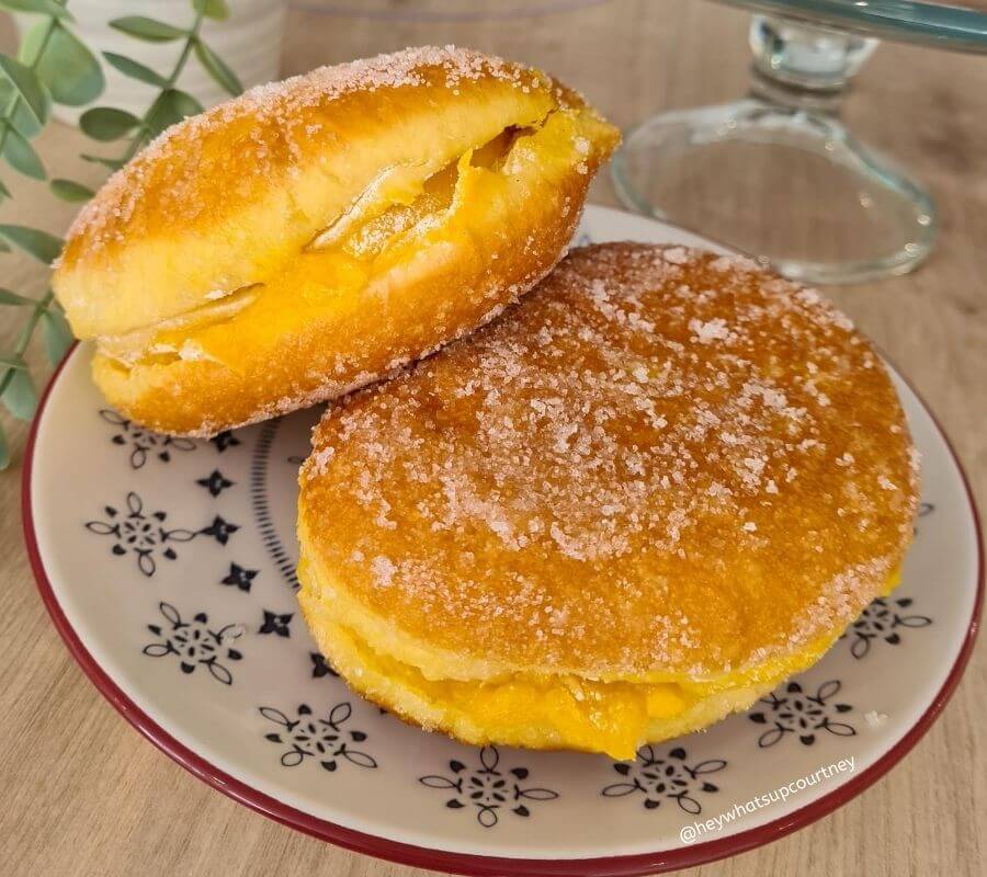 Bola de Berlim, a giant custardy doughnut which is very popular in Portugal. Commonly sold at the beach. This one is sold at a Portuguese Cafe in Newcastle UK - www.whatsupcourtney.com