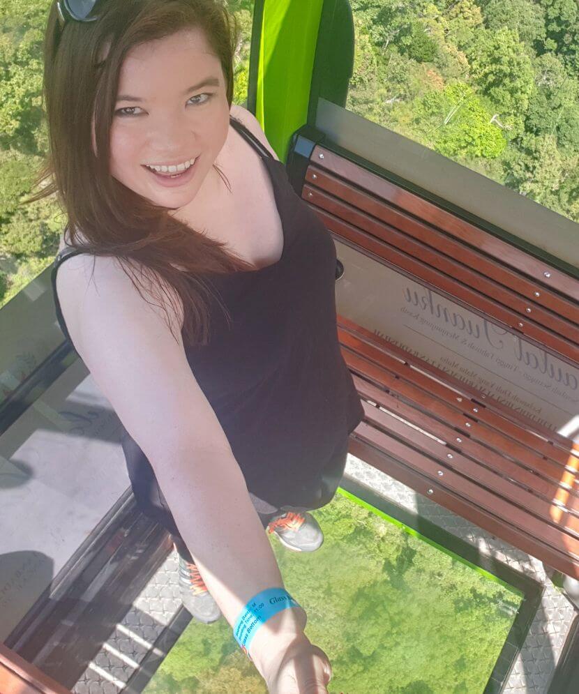 Courtney from whatsupcourtney.com (heywhatsupcourtney0 on a cable car in Langkawi Malaysia