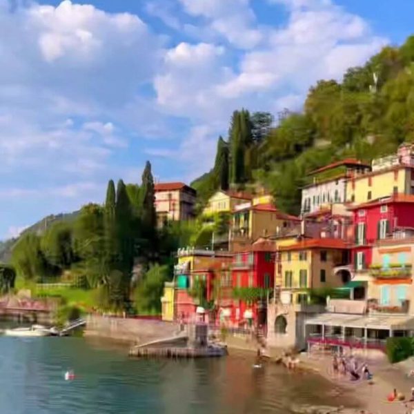 Varenna in Lake Como beach with a backdrop of colourful buildings