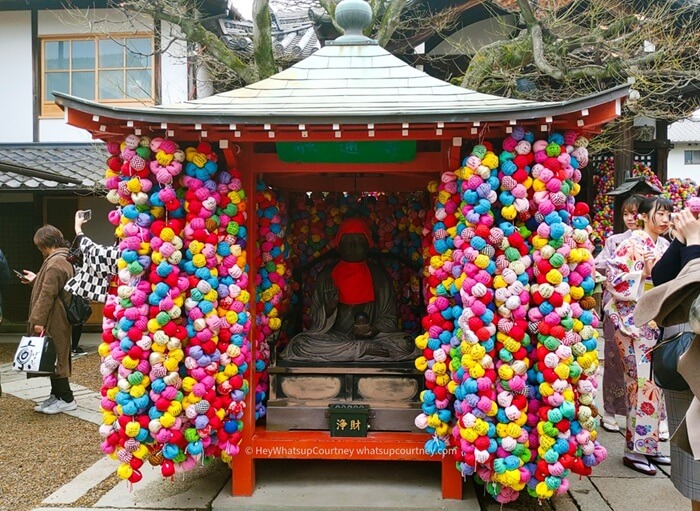 Yasaka Koshin-do temple, a shrine full of pom pom like balls