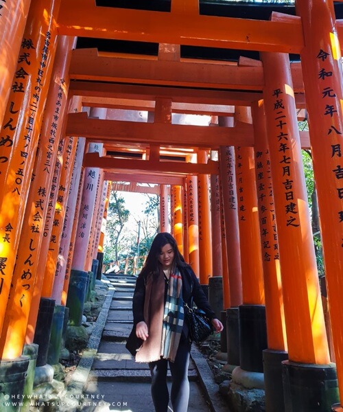 Fushimi Inari torii gates with Courtney from whatsupcourtney.com walking through