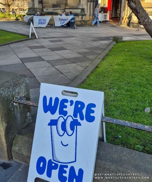 Tommy coffee shop sign in front of st marys cathedral in newcastle Upon Tyne, an independent coffee shop in Newcastle