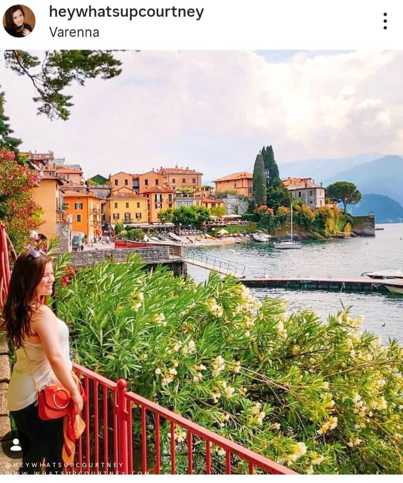 Courtney from whatsupcourtney.com posing at the lovers pathway in Varenna Lake Como