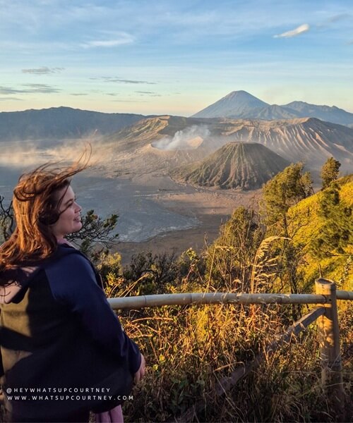 Courtney posing in front of mount bromo indonesia