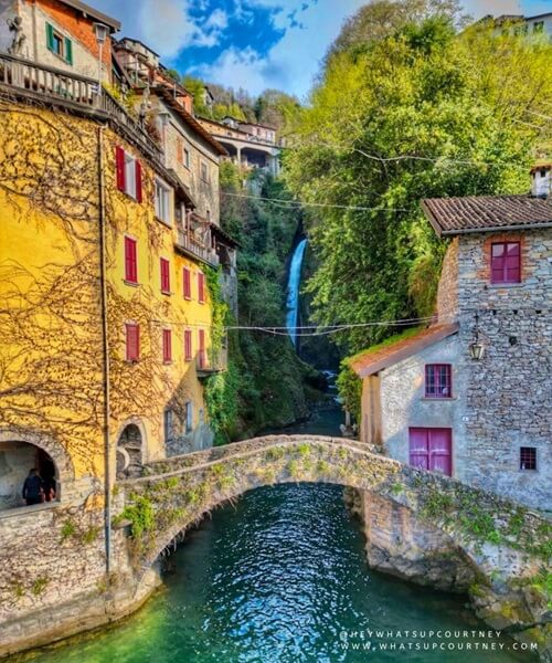 Stunning view of the famous bridge and waterfall in Nesso