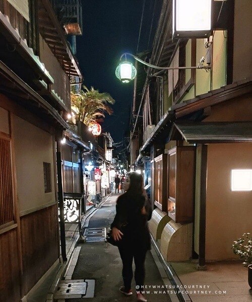 Courtney walking through Pontocho alley in Kyoto Japan