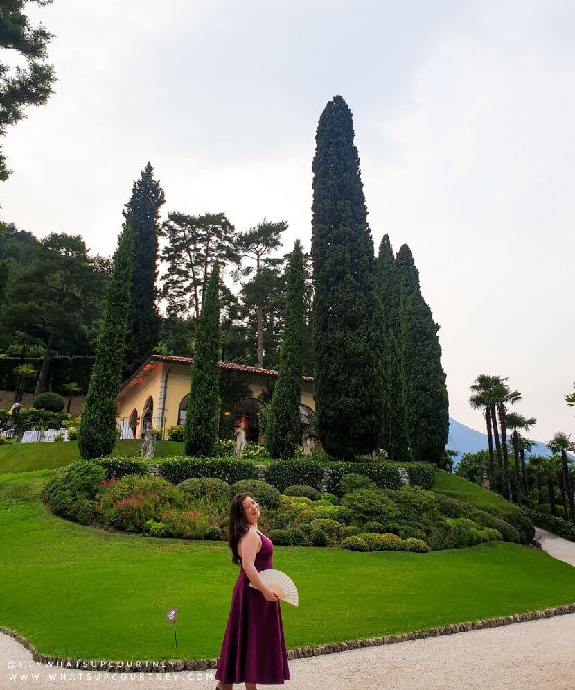 Courtney at Villa del balbianello wedding aperitif with a handheld fan