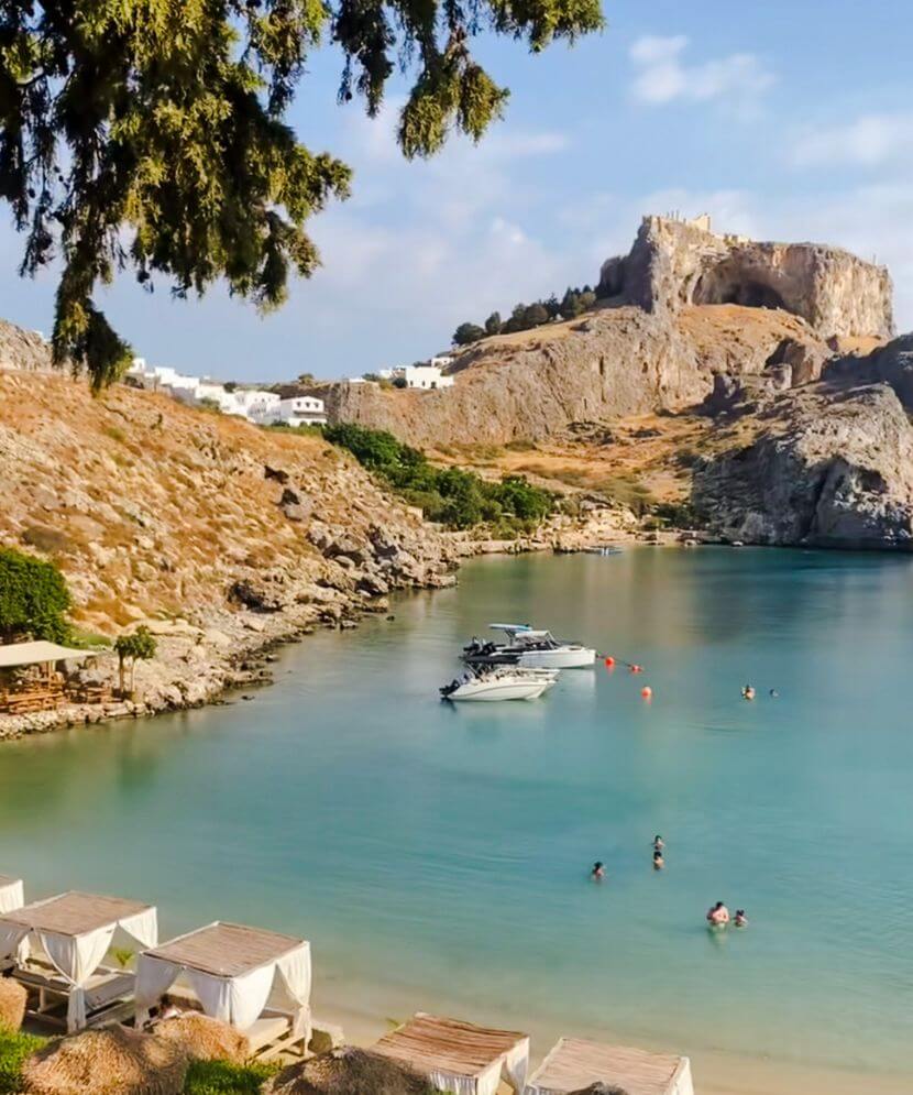 lindos beach, water and lindos acropolis rhodes part of your things to do in Lindos Rhodes